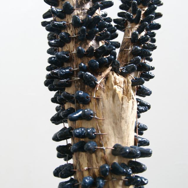 Brigitte Bouquet. Gum Tree (detail), 2009. ceramic, copper, wood. dimensions variable.